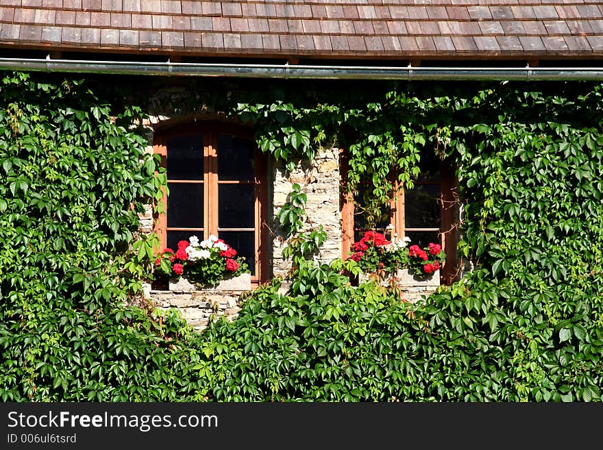 Traditional window of a small medieval castle in Europe. Traditional window of a small medieval castle in Europe