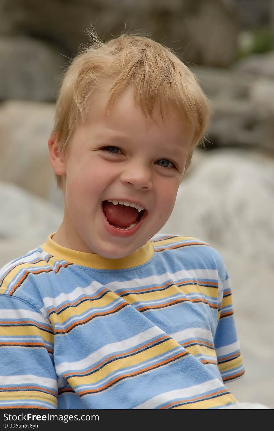 Young child portrait photographed outdoors. Young child portrait photographed outdoors