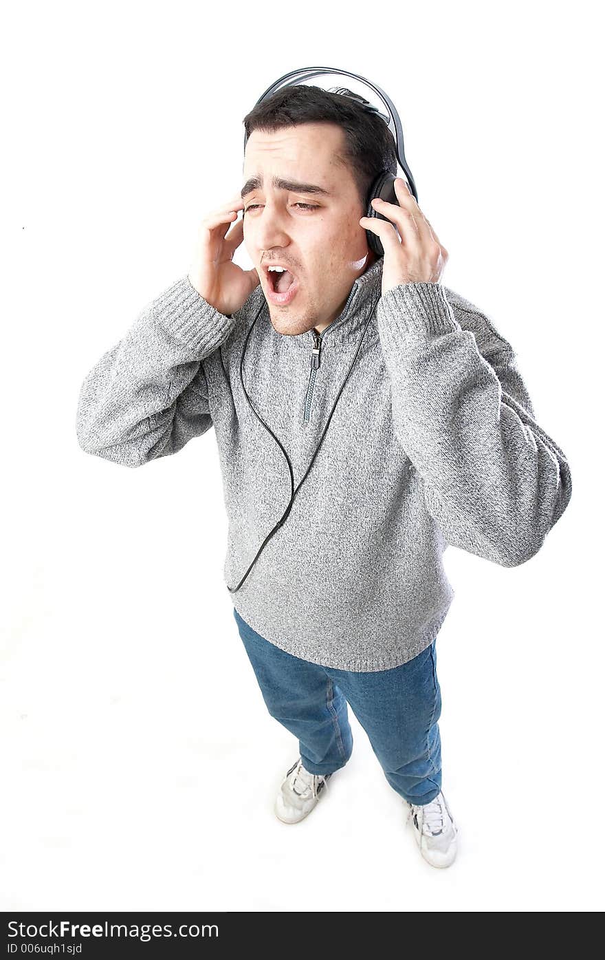 Man listening music with ear phones