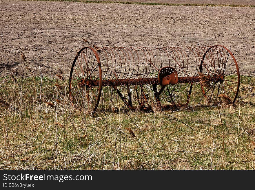 Old rotocultor on field