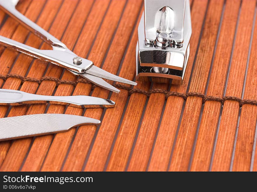 Grooming set on wooden mat. Grooming set on wooden mat