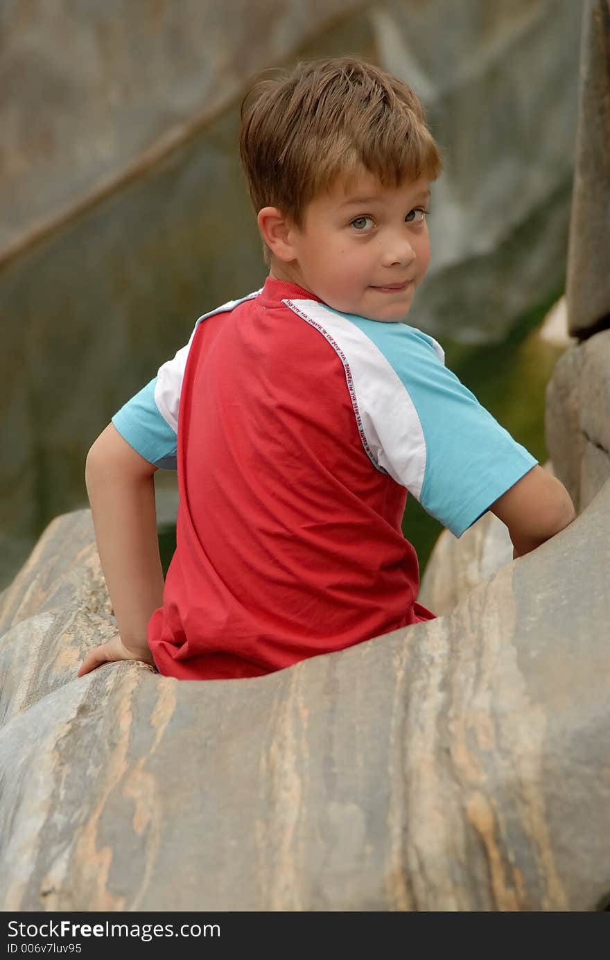 Young child portrait photographed outdoors. Young child portrait photographed outdoors