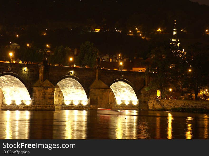 Charles bridge at night - mysterious scene in old prague city