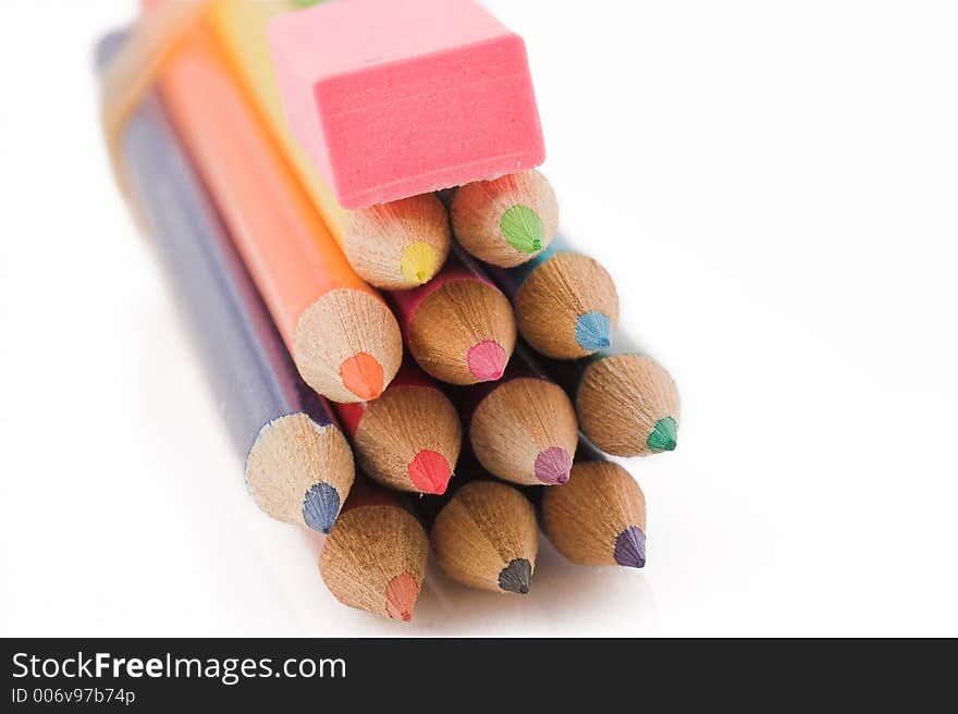 Pencils and eraser stacked on top