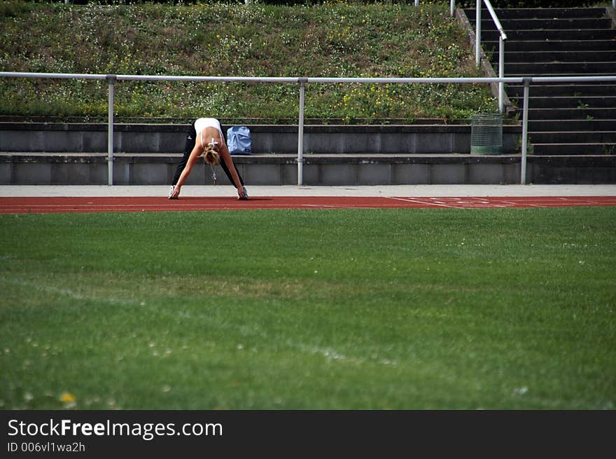 Single runner during warm up. Single runner during warm up