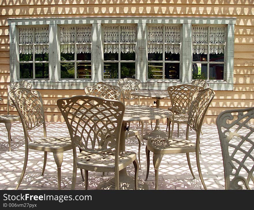 Shadow pattern on restaurant patio. Shadow pattern on restaurant patio