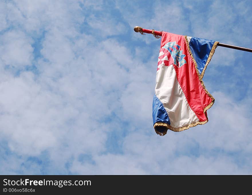 Croatian flag in the wind, sky in the background. Croatian flag in the wind, sky in the background.