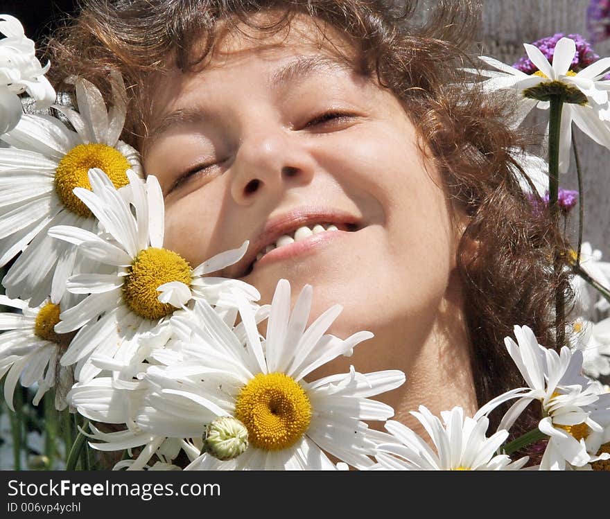 Smiling Woman With Daisies