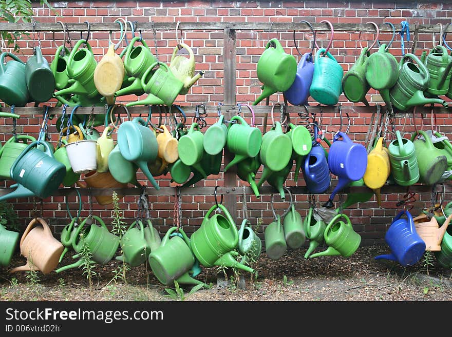 Watering cans hanging around. Watering cans hanging around