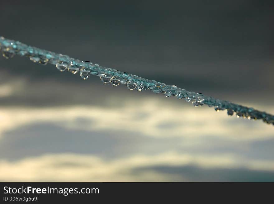 Droplet on clothes line. Droplet on clothes line