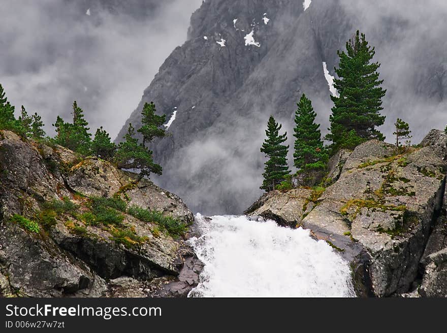 Big waterfall and mountain.