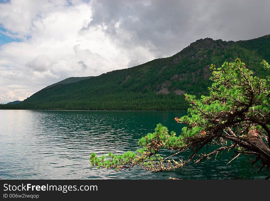 Blue Lake And Mountains.