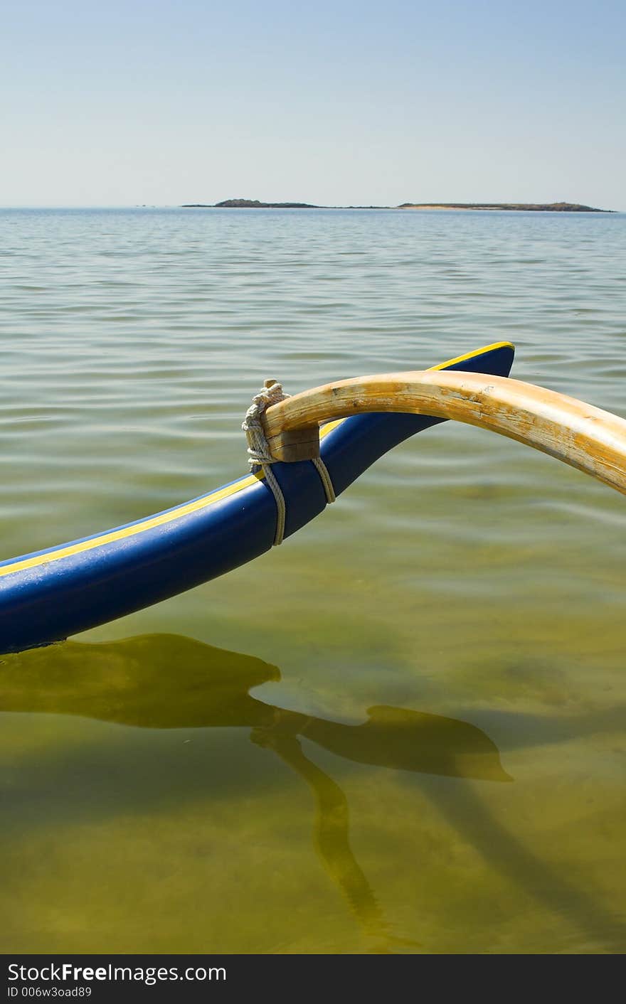 Pirogue on water on beautyfull beach