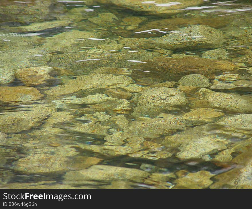 The Emerald Pool, Yosemite National Park, California. The pool occurs mostly due to snow run off, so it tends to be very clear. The green color (not apparent in the shot), comes from some mossy areas.