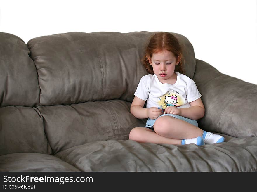 Girl sitting on couch. Girl sitting on couch