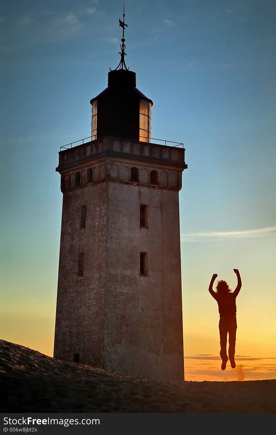 Sunset, lighthose and my friend jumping. Sunset, lighthose and my friend jumping...