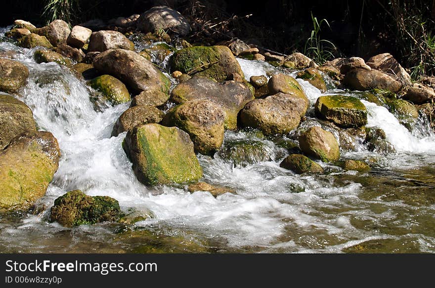 Panoramic view of a mountain river rapids. Panoramic view of a mountain river rapids