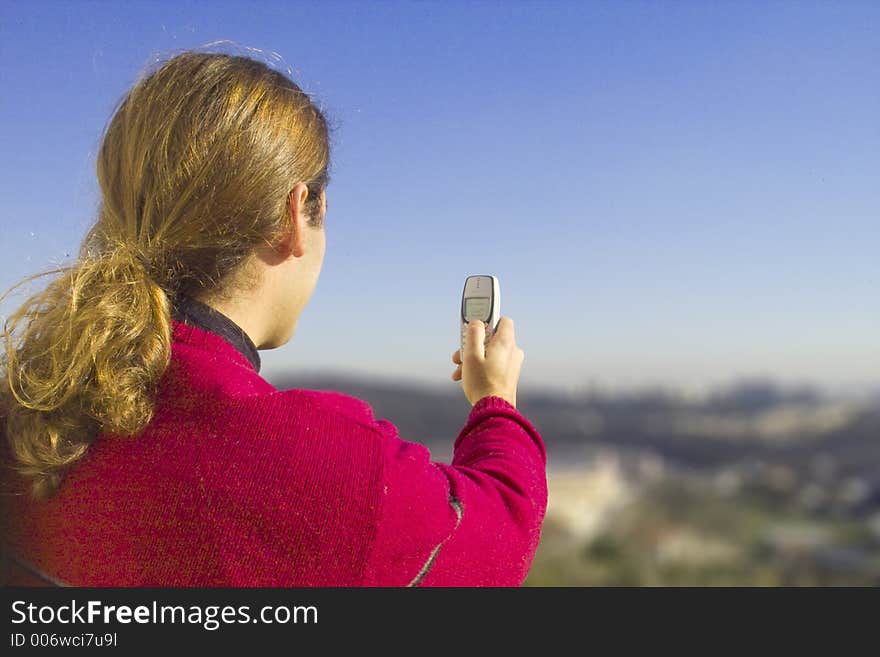 Man taking picture with a mobile phone