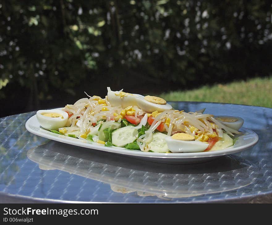 Fresh salad whit soya and boiled eggs.