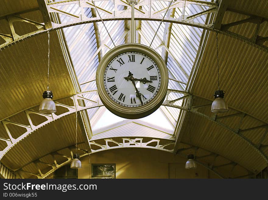 Big hanging clocks in a railroad station hall, Vitebsk Railroad Station, Saint Petersburg, Russia.