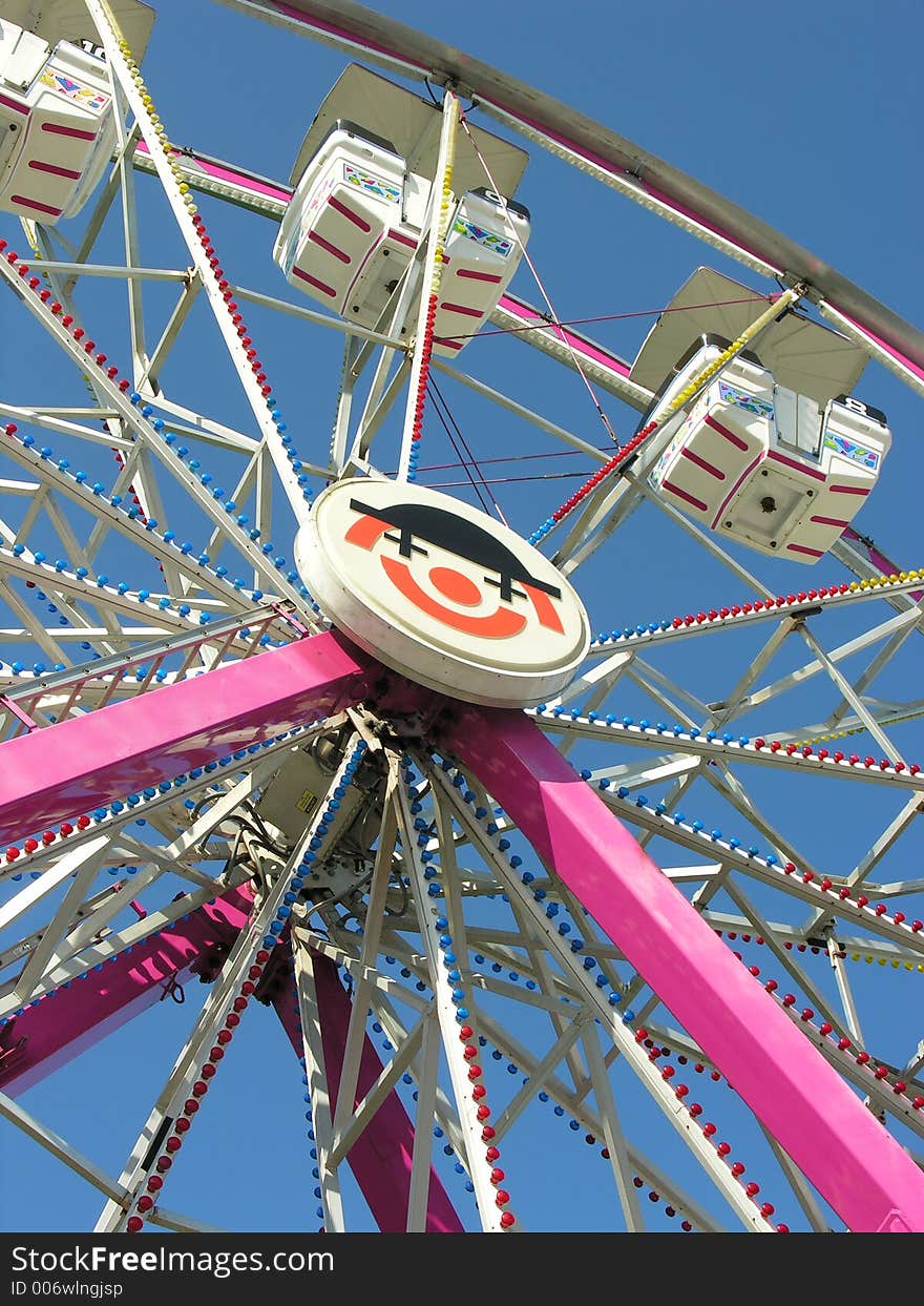 View of how high a Ferris Wheel look from the ground up.