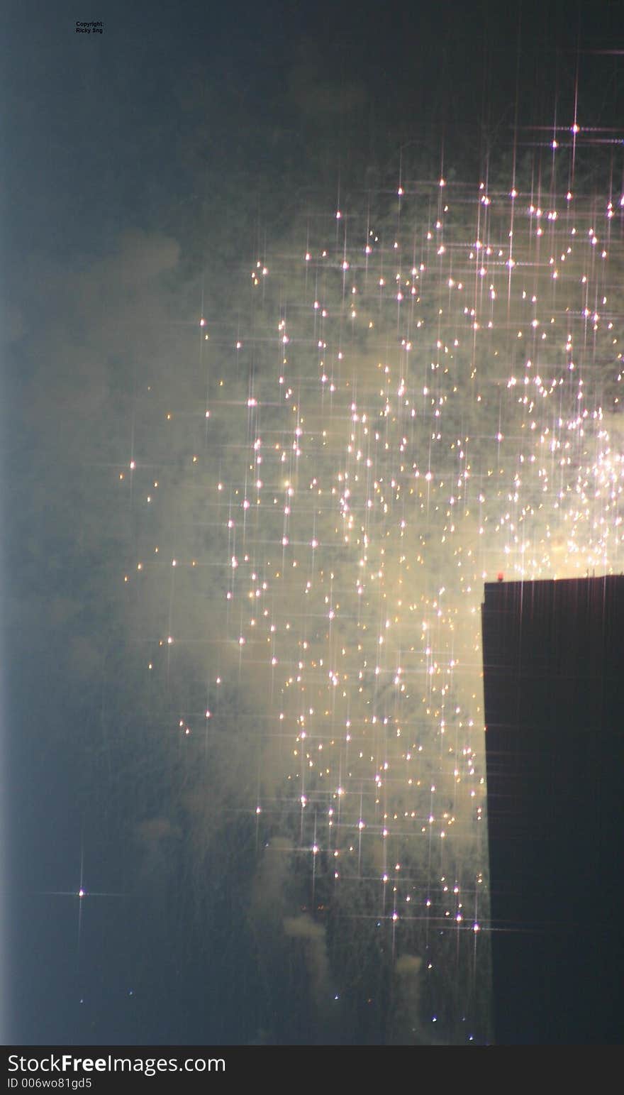 Fireworks over a building