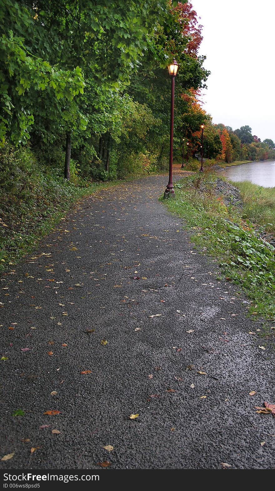 Empty wet path along the river. Empty wet path along the river.