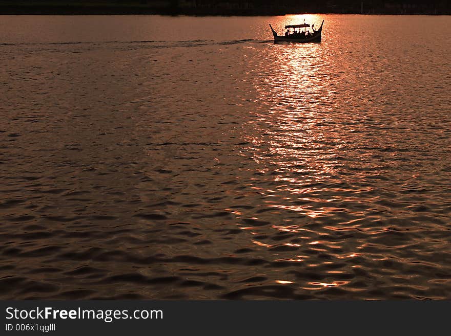 Couples enjoying gondola ride in sunset. Couples enjoying gondola ride in sunset