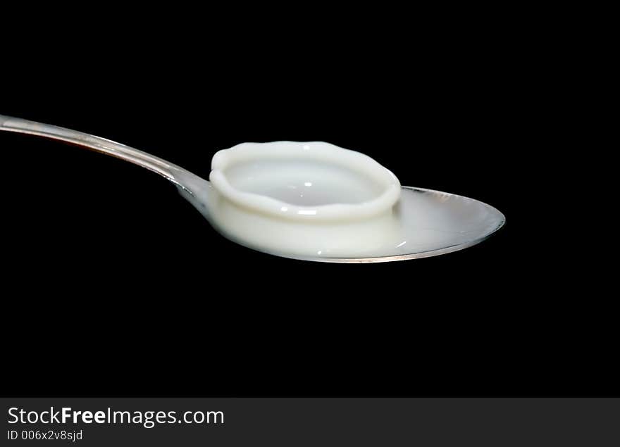 Milk splash on spoon