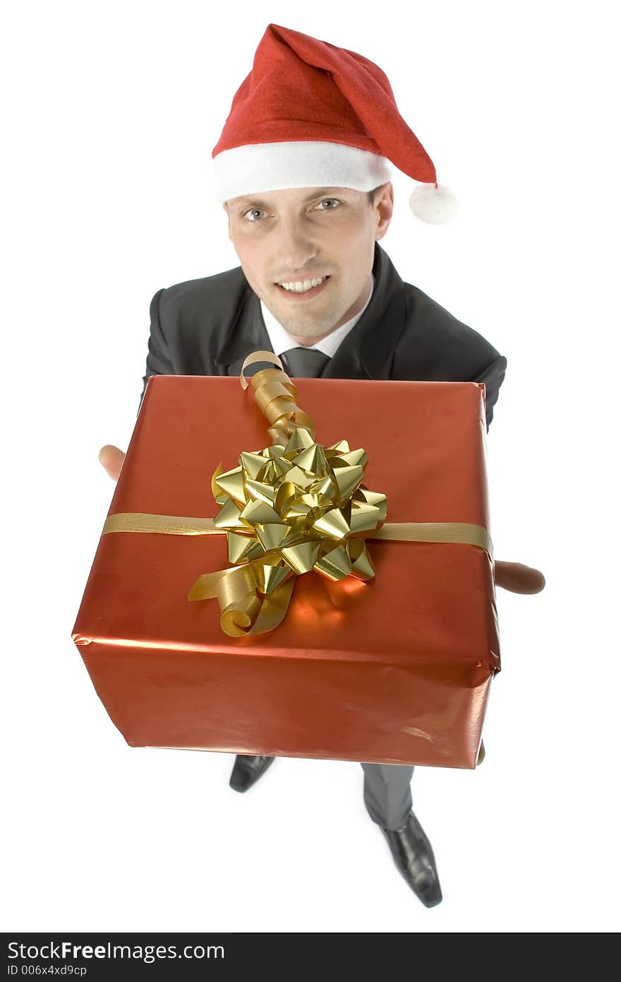 Isolated man with gift wearing Santa's cap. Isolated man with gift wearing Santa's cap