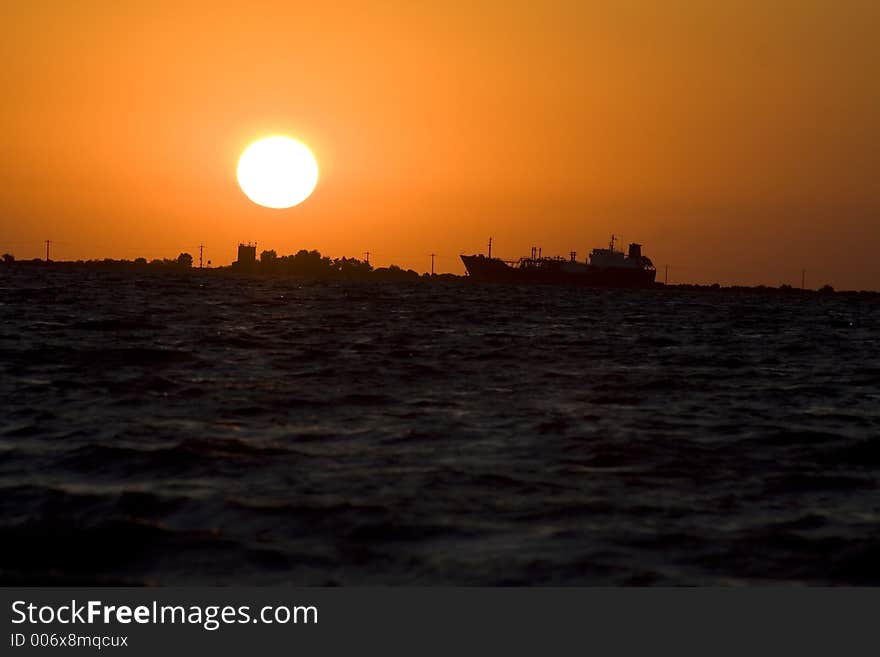 Sea Sunrise and boat silhouette. Sea Sunrise and boat silhouette