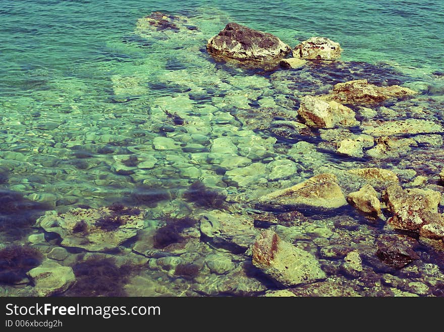 Greenish waters and rocks