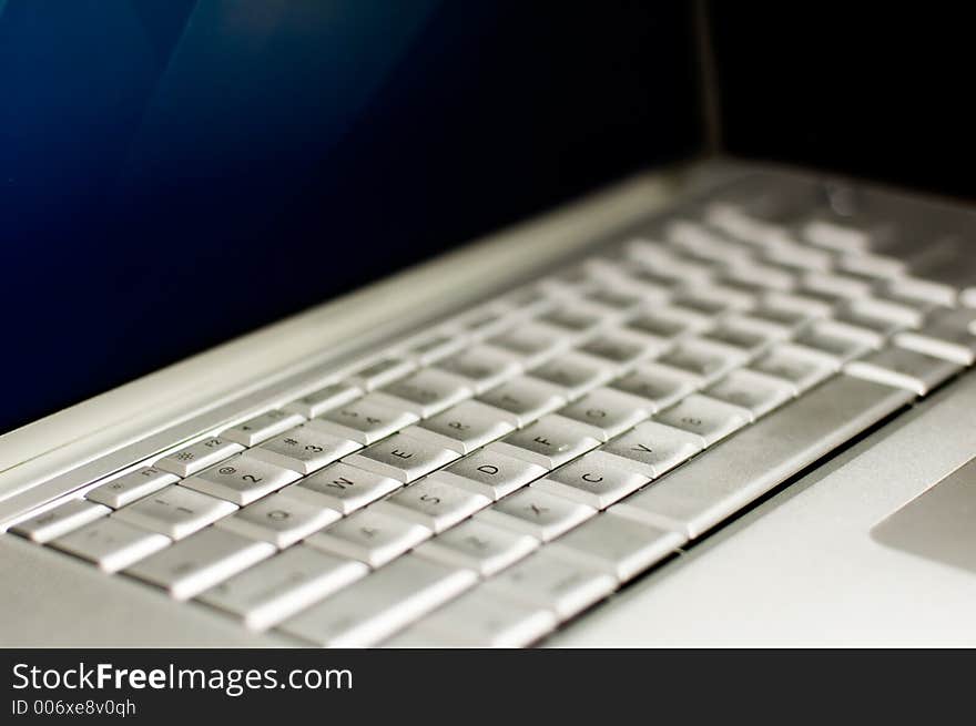 Laptop Keyboard with blue lcd screen
Shallow Depth of field