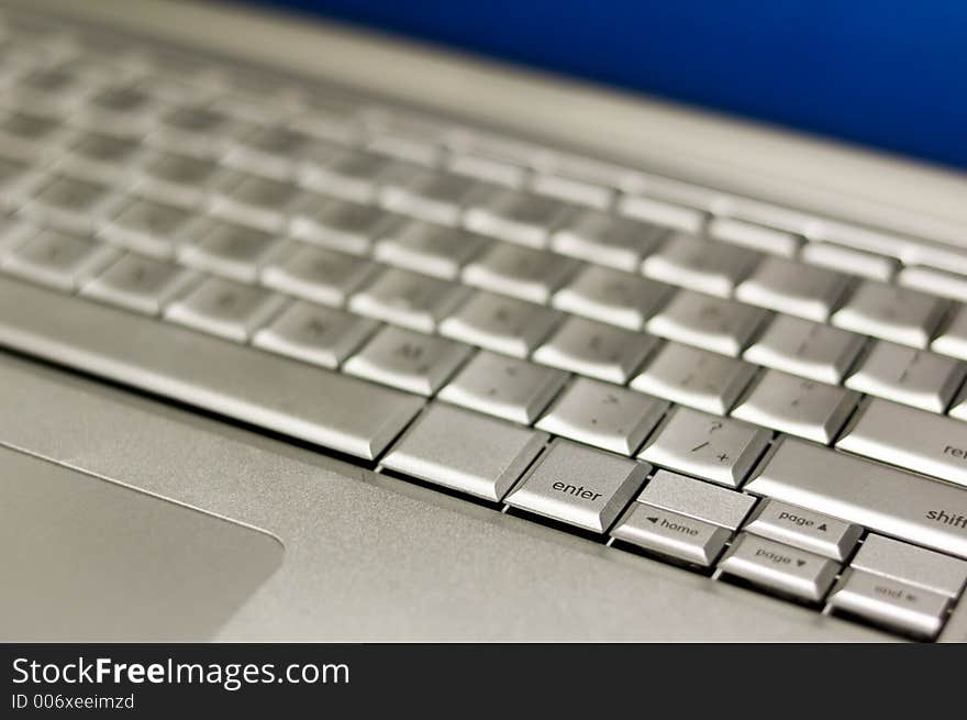 Laptop Keyboard with blue lcd screen
Shallow Depth of field