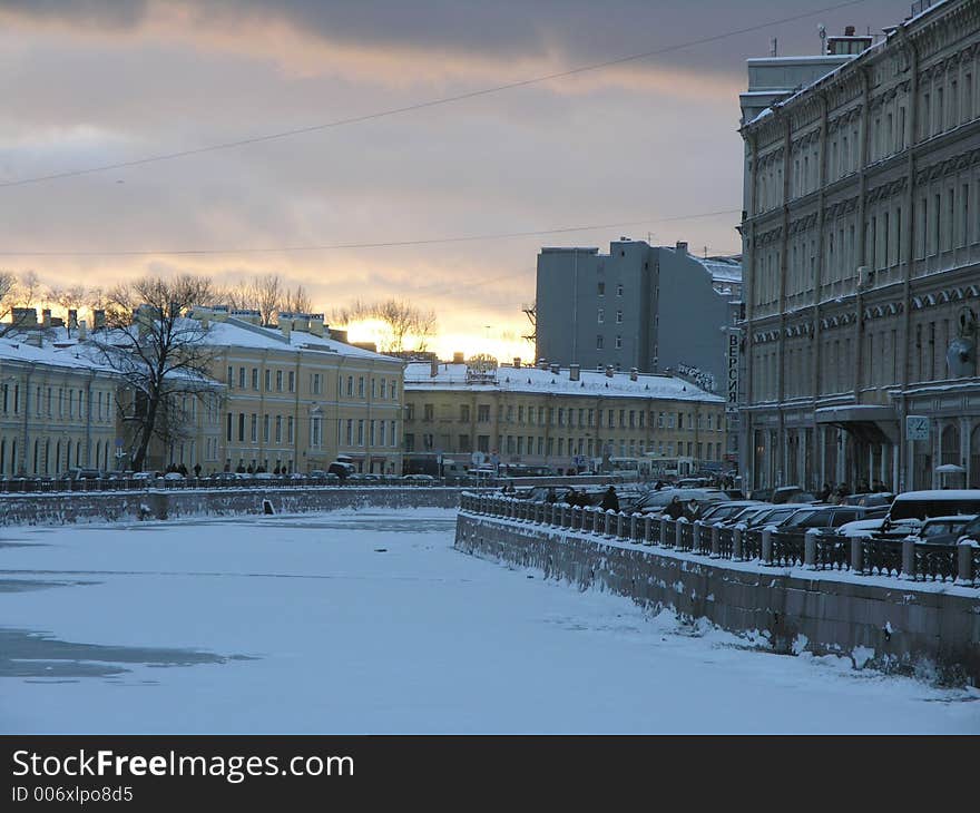 Sunset over Moika river in winter Saint-Petersburg