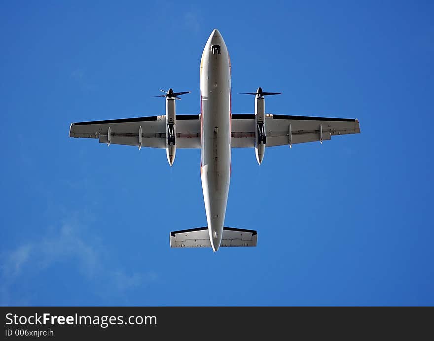 A picture taken directly underneath an aircraft. A picture taken directly underneath an aircraft