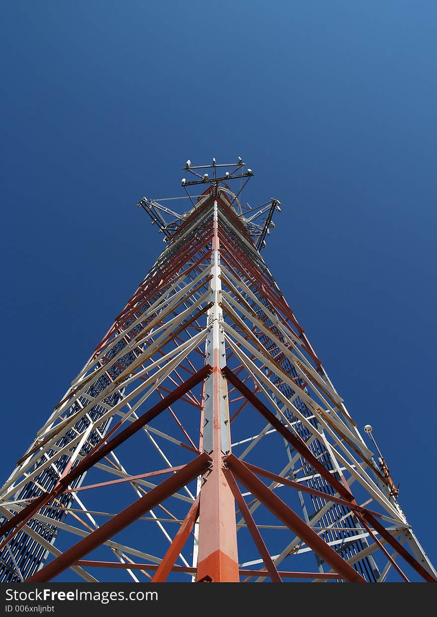 Telecomm tower from side in clear sky