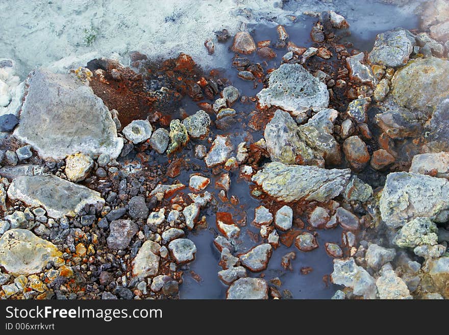 Colors in the ground at a place where geothermal heat burst up to the surface, all kinds of colors and textures in the ground. Colors in the ground at a place where geothermal heat burst up to the surface, all kinds of colors and textures in the ground