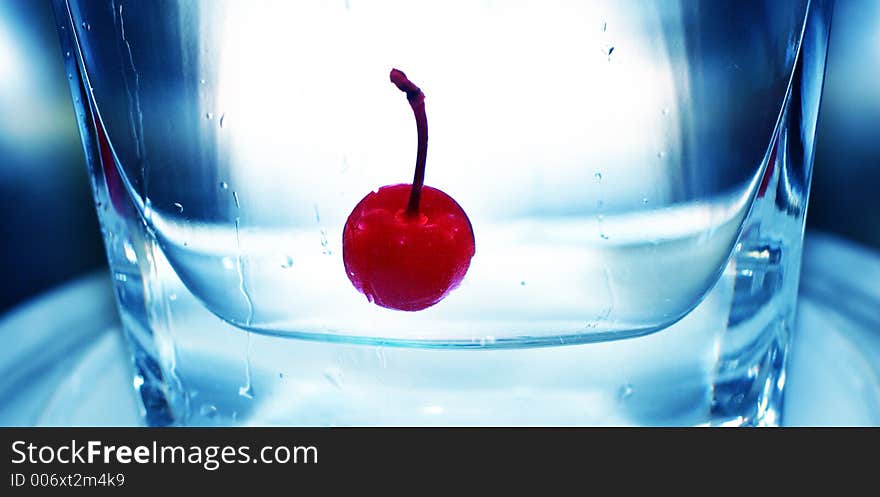 Red cherry in glass