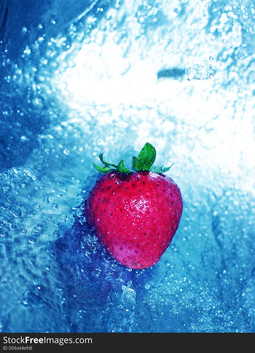 Strawberry in clear water