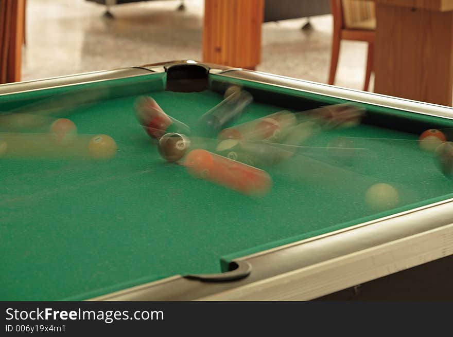 Speedy balls on billiard table - motion blur