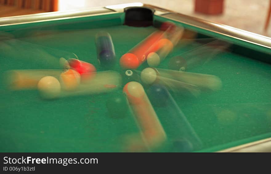 Speedy balls on billiard table - motion blur