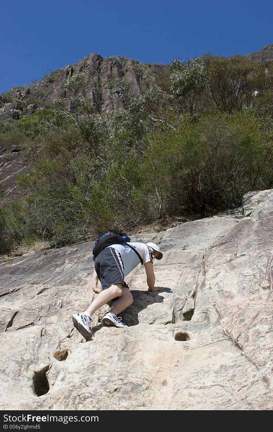 A steep climb uphill a mountain. A steep climb uphill a mountain.