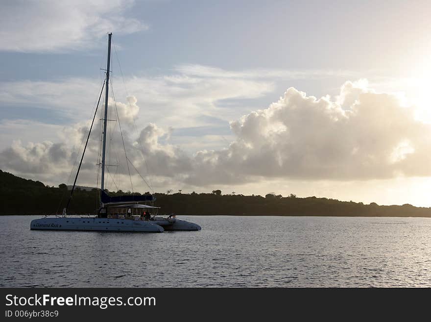 Catamaran photograped at sunset