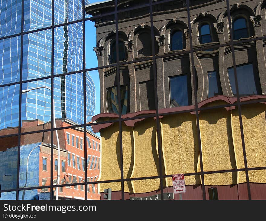 Reflections of Old Buildings in a New Mirrored Building. Reflections of Old Buildings in a New Mirrored Building