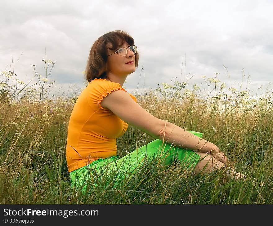 Girl reposes on grass. Girl reposes on grass