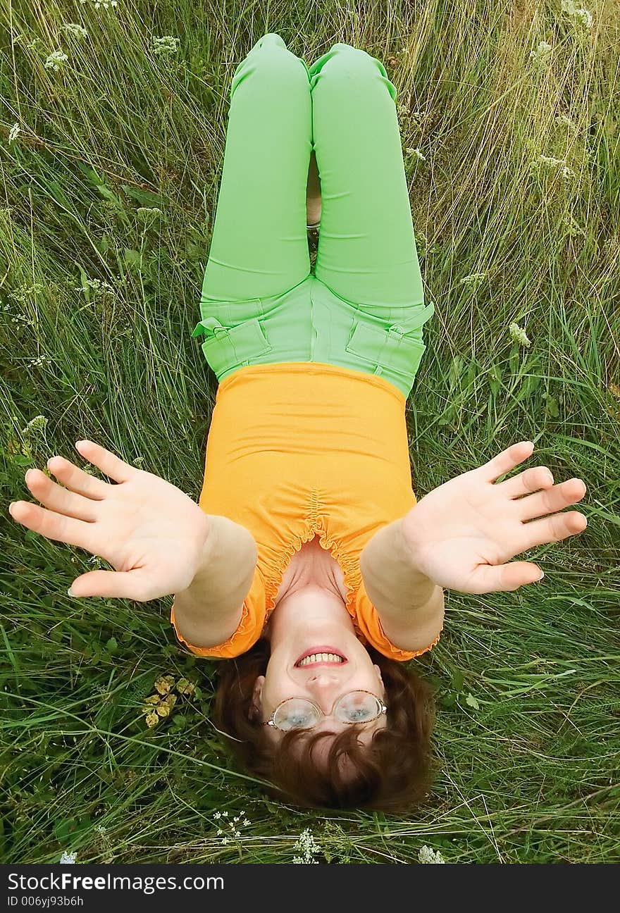 Girl reposes on grass. Girl reposes on grass