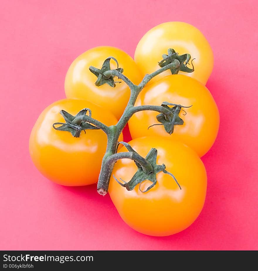 Tomatoes on red