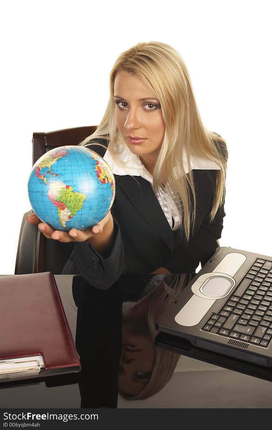 Young businesswoman with globe in her hand. Young businesswoman with globe in her hand