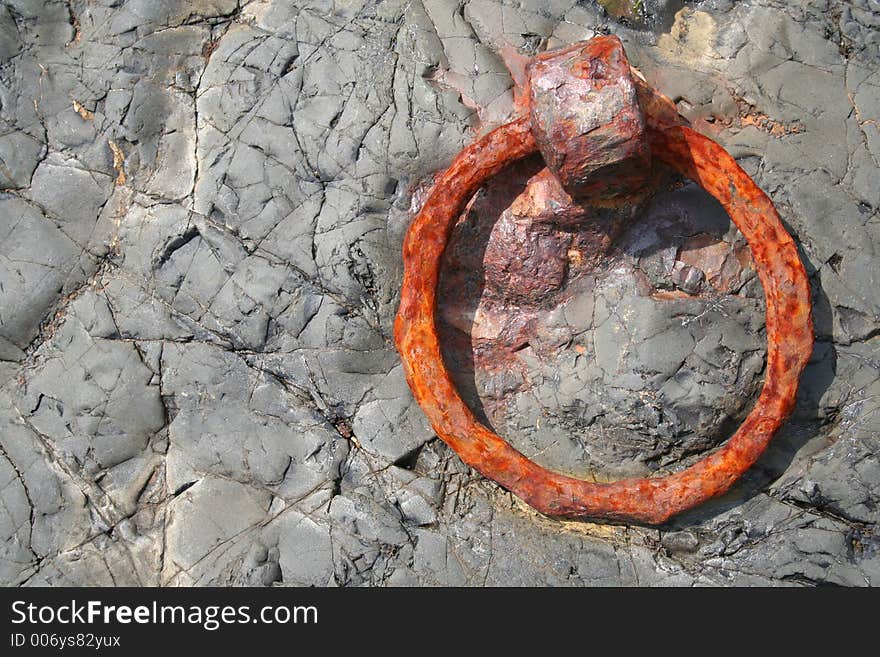 Rusted steel ring at Lindisfarne